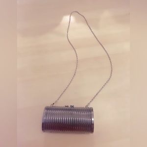 Round silver clutch with chain